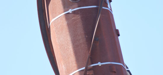 Vibration monitoring equipment on the leg of a tower