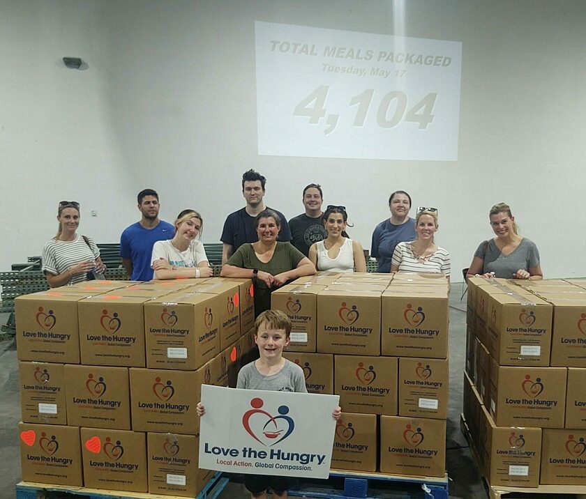 Photograph of the team during a love the hungry event