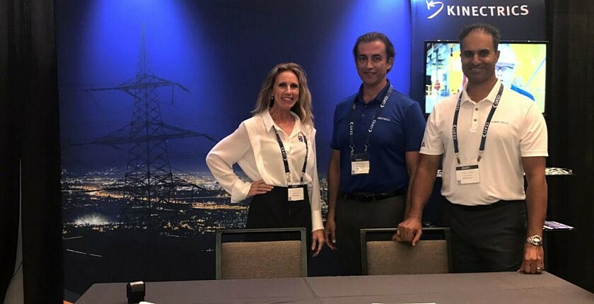 Photograph of Kinectrics representatives at the CEATI distribution conference