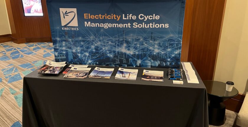 Kinectrics booth lined with brochures at the 2022 ICC fall meeting