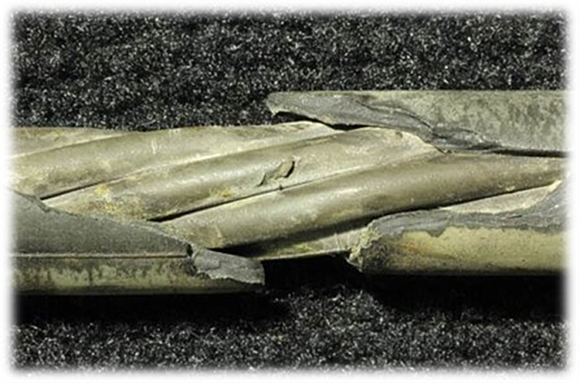 Closeup photograph of a damaged cable