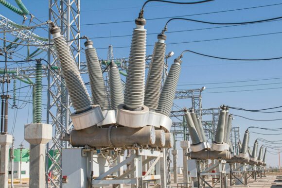 Closeup photograph of large outdoor substation equipment