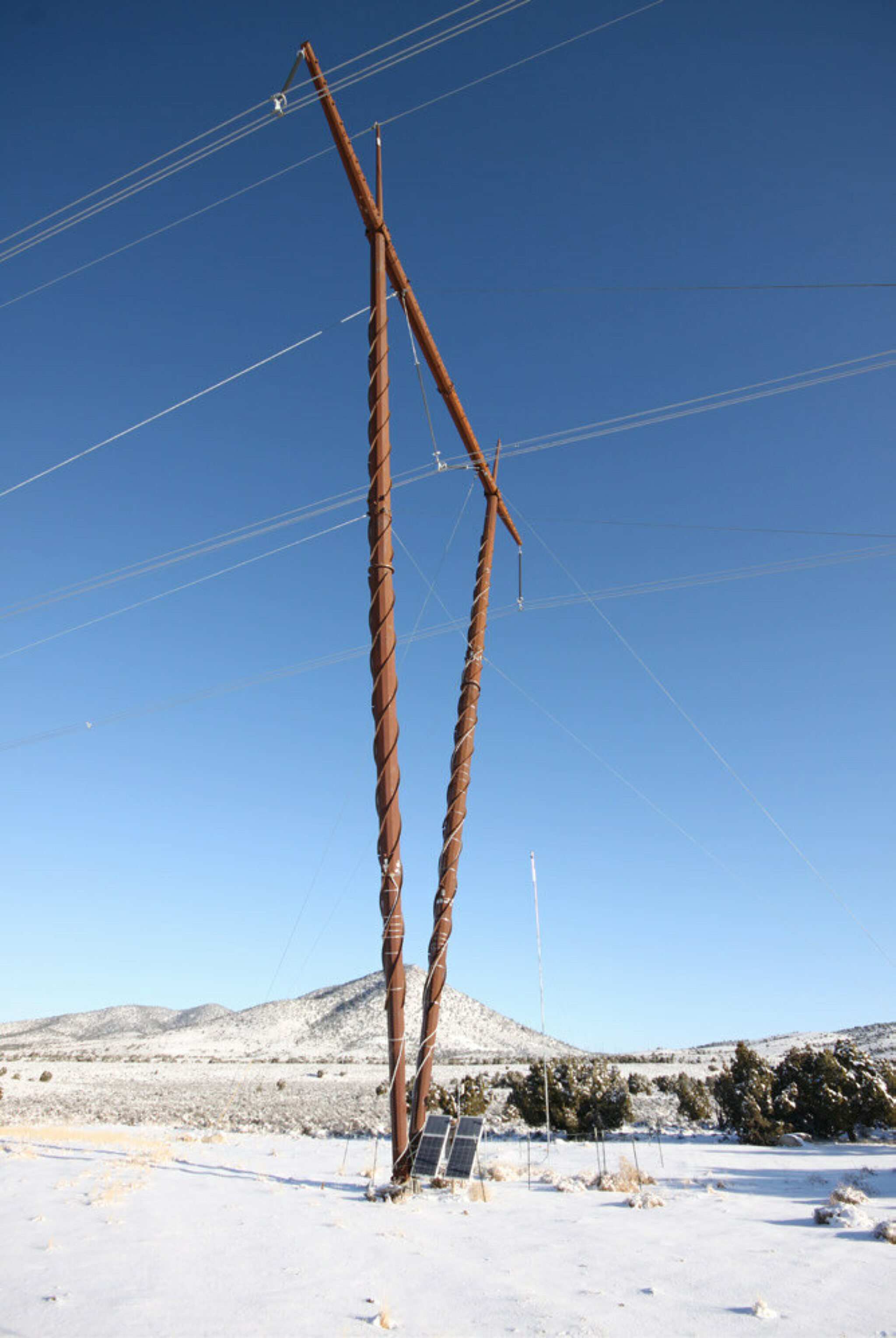 Outdoor photograph of a large transmission tower