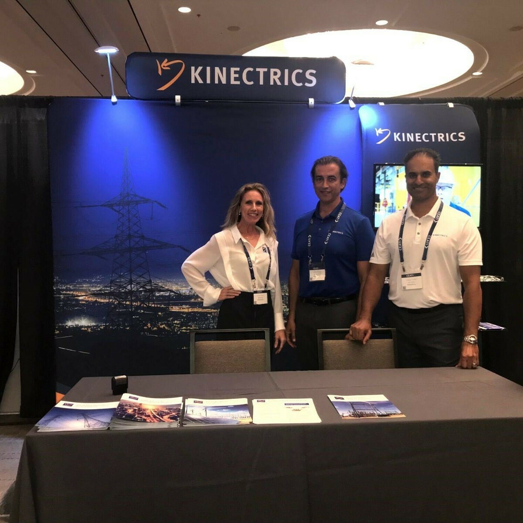 Photograph of Kinectrics representatives at the CEATI distribution conference
