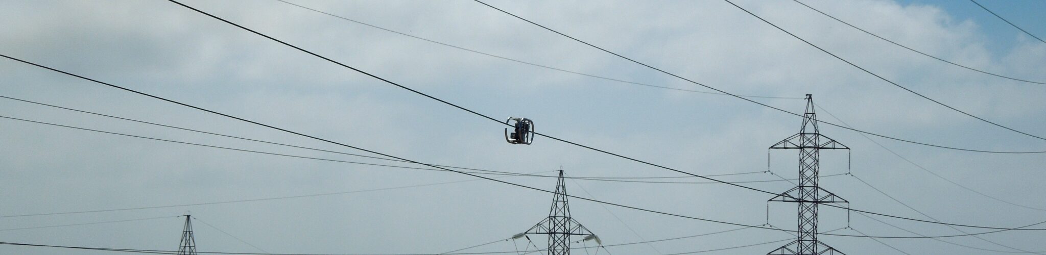 The Kinectrics LineVue tool inspecting a live powerline